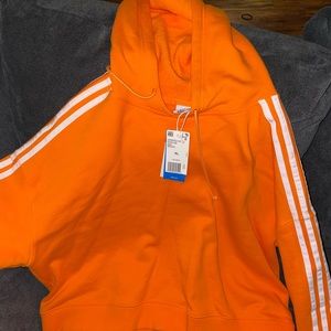 Brand new, Orange cropped ADIDAS hoodie. Super cute, never worn.